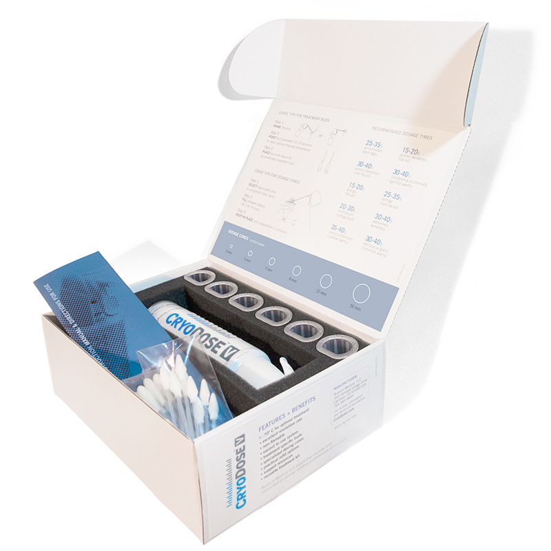 CryoDose cryotherapy kit with spray canister, applicators, and accessories in an open box.