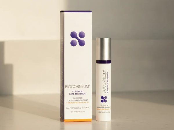 Biocorneum SPF 30 10g product info and reviews hero image showing a compact scar gel tube and box in a clean clinical setting