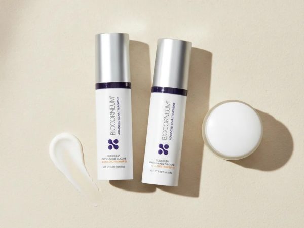Biocorneum vs Silagen comparison image showing two medical-grade scar gel tubes with SPF and SPF-free routine cues